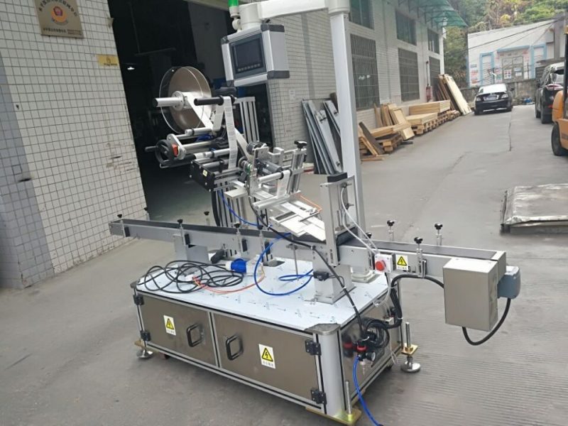 Κίνα Αυτοκόλλητη κορυφή ετικέτα μηχανή για ηλεκτρικό οδηγημένο τύπου θήκη ακροφυσίου προμηθευτής